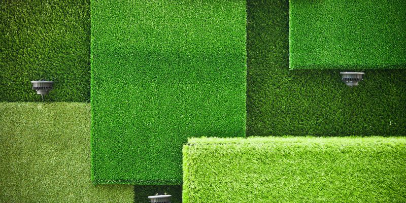 lay under artificial grass